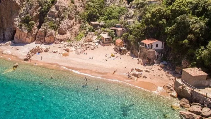 Ficaghjola beach and its turquoise water, below the cliffs of Piana